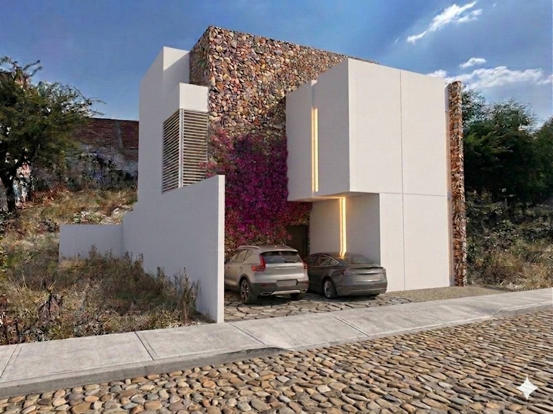 Residencia con muro de piedra de río y bugambilia